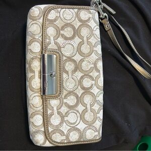 Stylish Beige Wristlet with Silver Accents